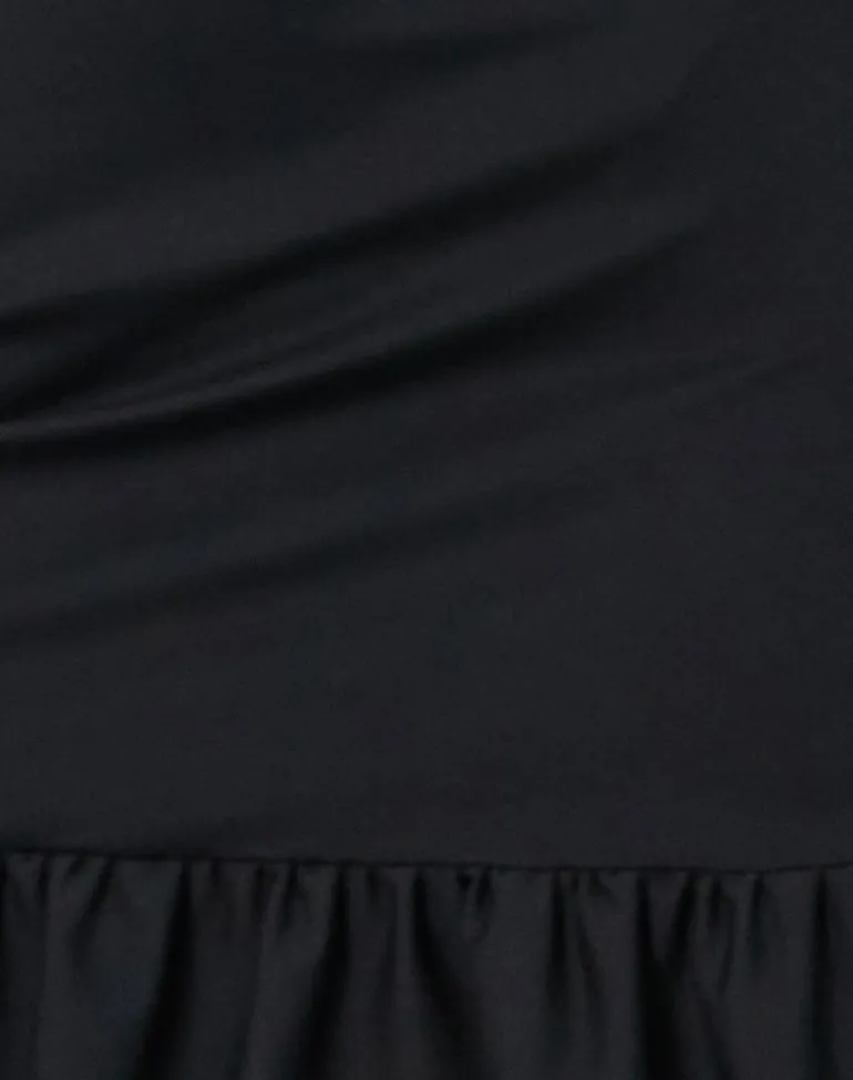 Jessa Ruffle Hem Buckle Strap Mini Dress in Black