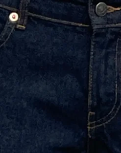 Rigid Low Rise Flare Jeans In Indigo