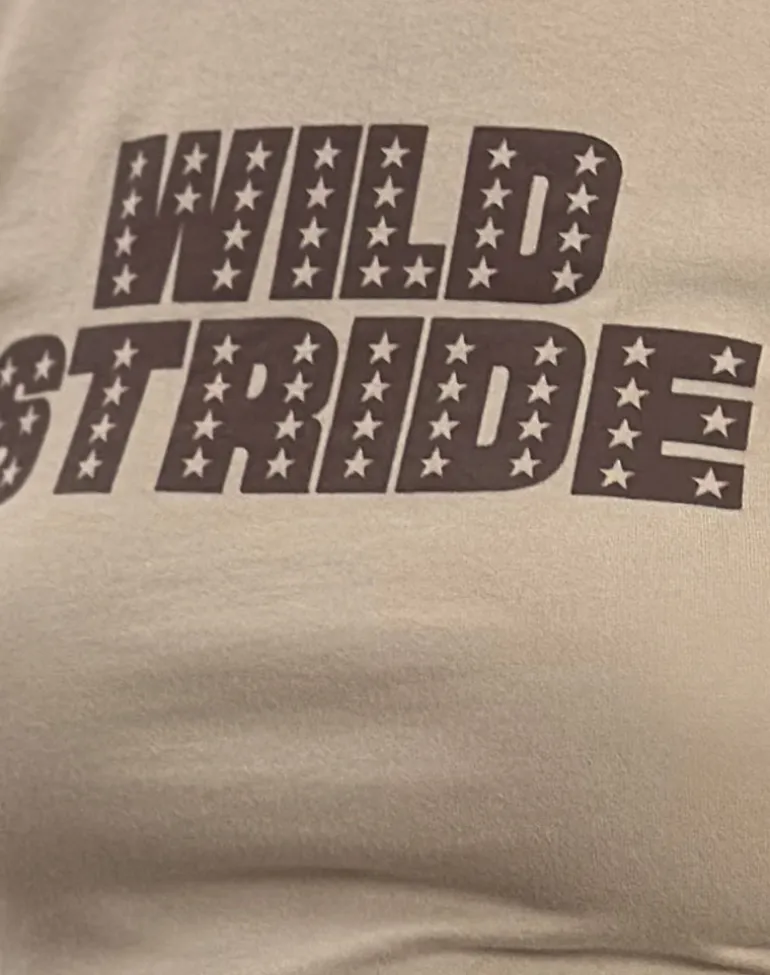 Sutin Tee in Coconut Milk with Wild Stride Graphic
