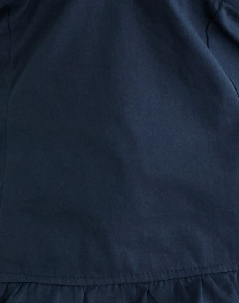 Tamzen Halterneck Top in Dark Navy with Frill Hem