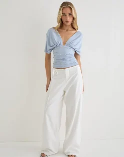 Vernia Plunge Batwing Top in Lyocell Dusty Blue with Pearl Buttons