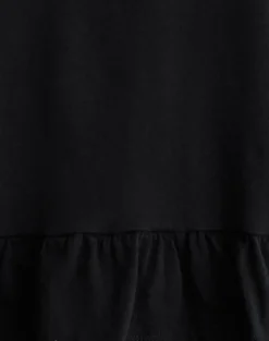Vivala Boxy Long Sleeve Top in Black with Frill Hem